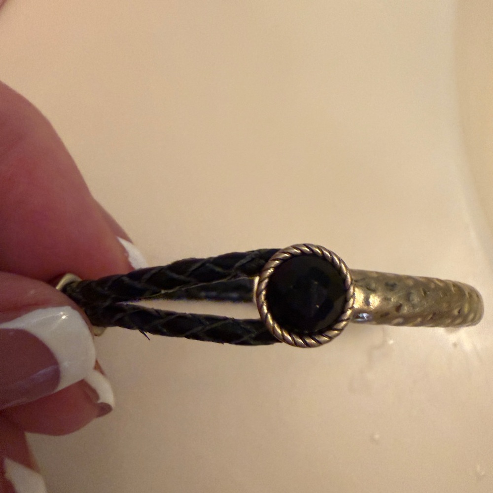 Gold-Tone Bracelet with Black Faceted Stone and Braided Leather